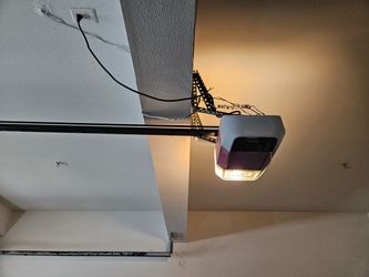 Garage Door Opener Spring Off Track Adjustment Replace And Parts