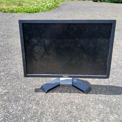 Two old-school DELL computer monitors