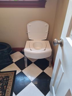 Never used bedside commode. Partially assembled for demonstration and pics