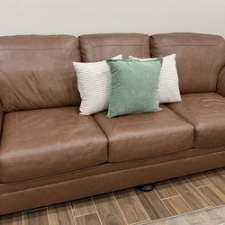 Leather sofa and love seat set new