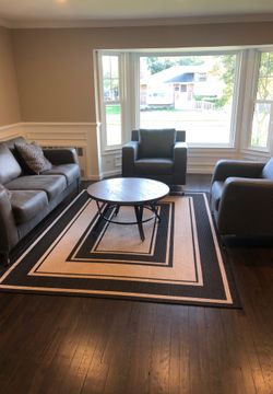 Ashley couch two chairs coffee table and rug only use for staging