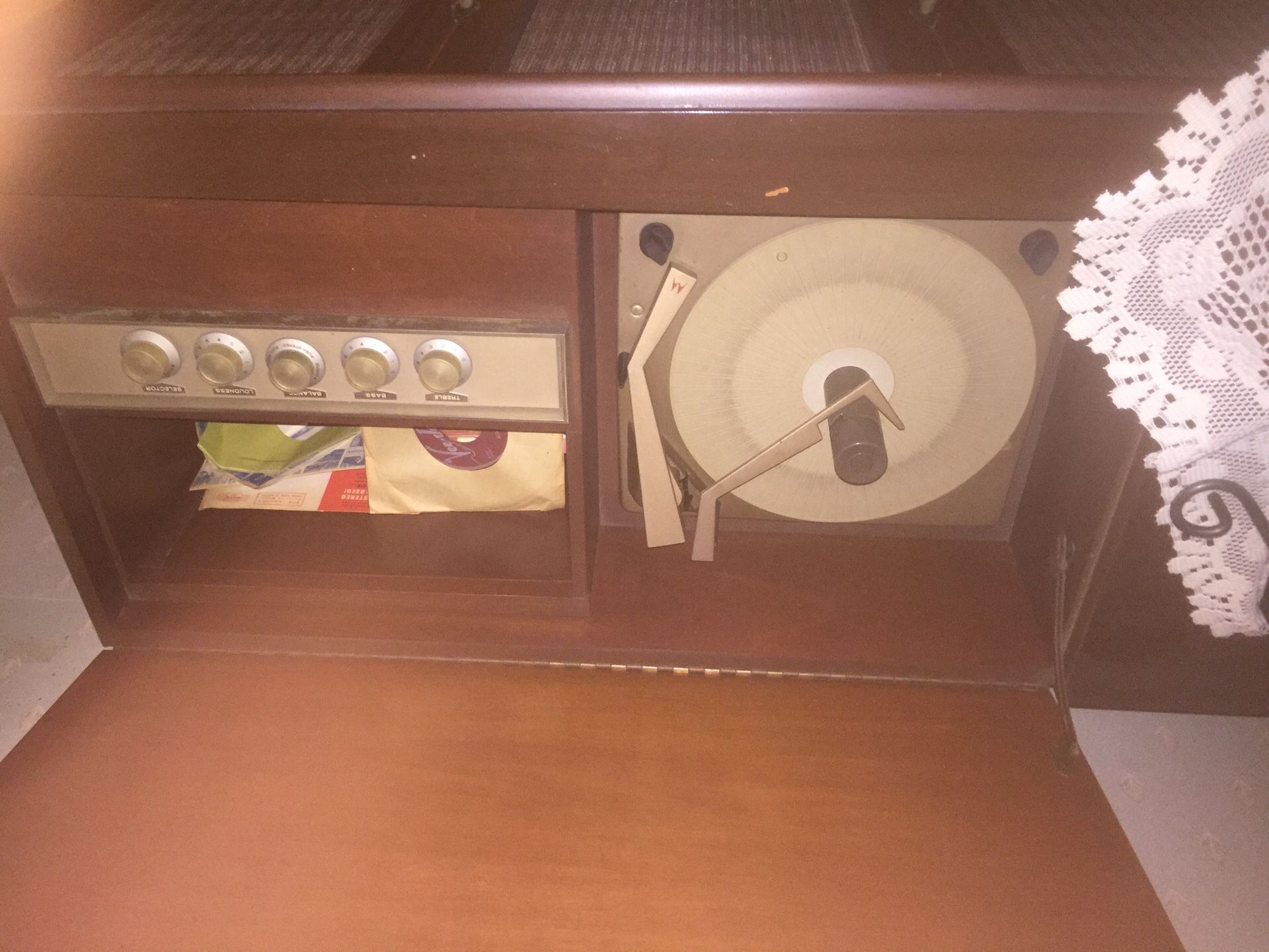 Antique record player along with table $350
