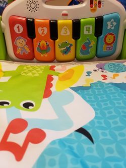Fisher price piano play mat.