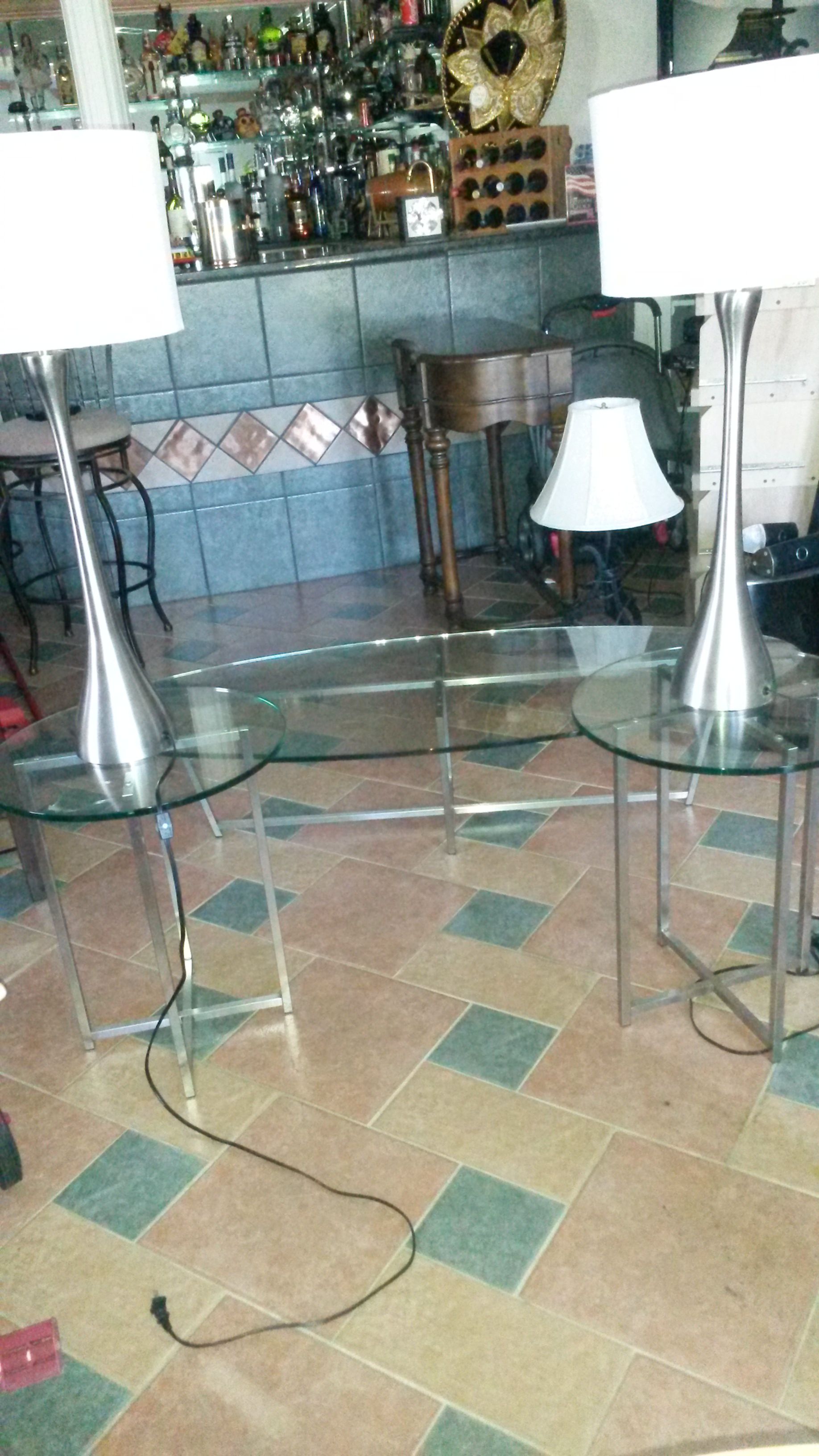 New 3 piece glass and metal coffee table set