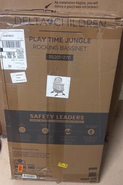 Delta Children Play Time Jungle Rocking Bassinet