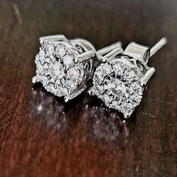 Unisex Diamond Earrings Set In 14K White Gold (1/3 c.d.t.w. each; not lab grown)