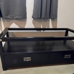 Coffee table with glass top