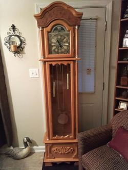 Really nice grandfather clock work's great chimes every hour