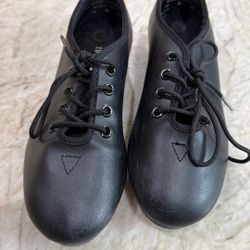 Little Girl Tap Shoes And ballet Slippers