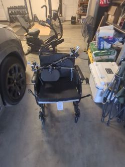 Black Manual Wheelchair with Arm Supports