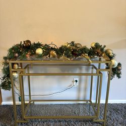 Like new Gold medal console table with glass