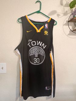 NBA Stephen Curry Warriors black jersey with white and yellow accents
