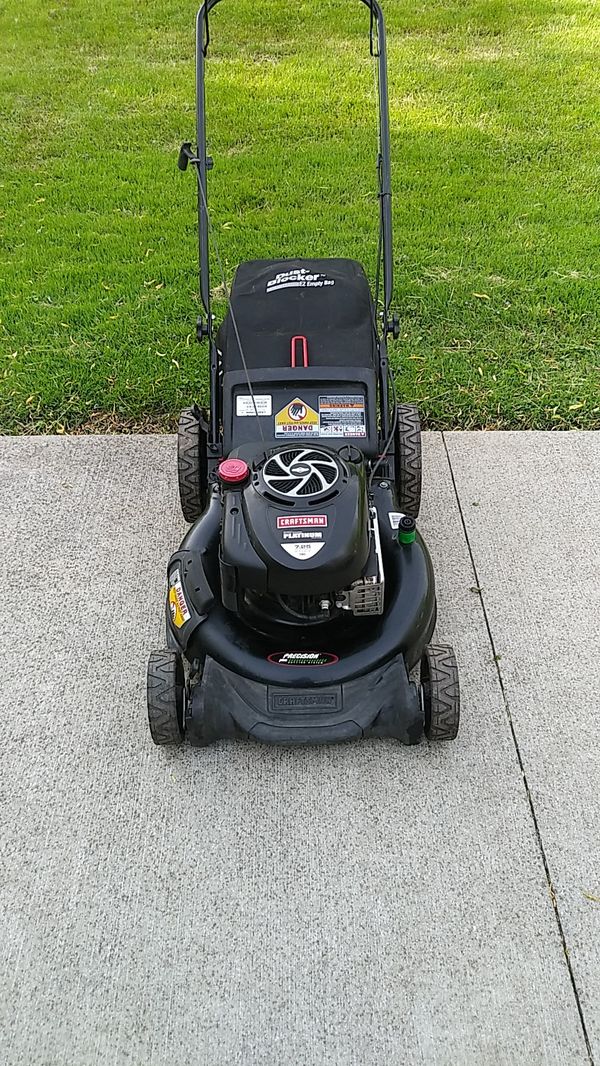 Craftsman 190cc push lawn mower with a bag and high wheels for Sale in