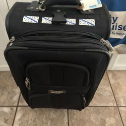 Delsey Luggage Rolling Overhead And An Overnight Bag 