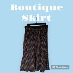 Effie's Heart Boutique Skirt with small Rainbow colored Stripes that flatter your shape. Outside pockets. A-Line fit 