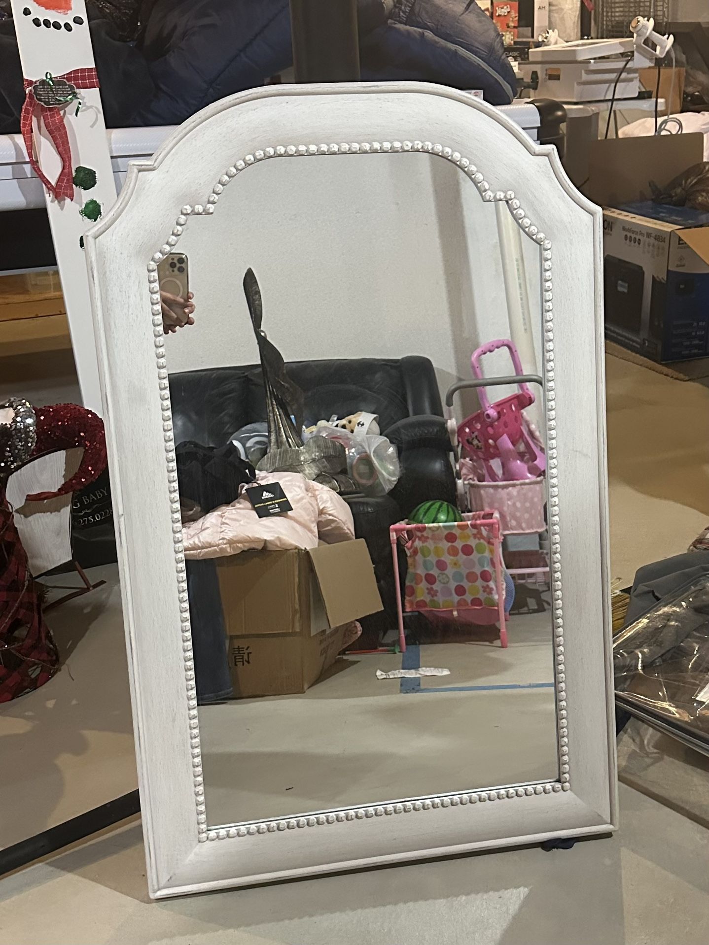Pretty white distressed arch wall mirror