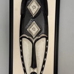 Framed African tribal wooden mask