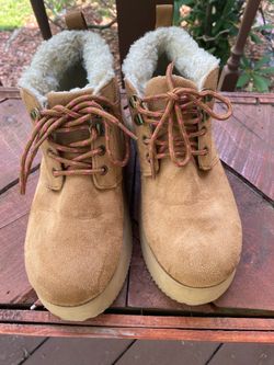Platform boots size 8 . A little wear and tear.