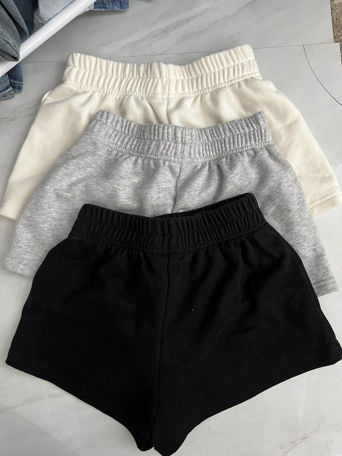 Shein 3 pairs of shorts in cream, grey and black