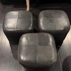 3 Black Leather Ottomans