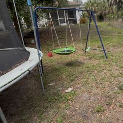Children Outdoor playground - swing and trampoline
