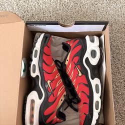 Nike air maxes red and gold