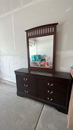 Matching dresser with mirror and bed frame