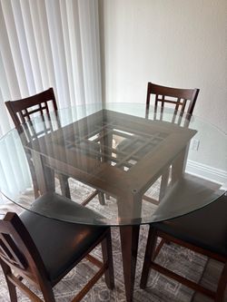 High top table with 4 chairs