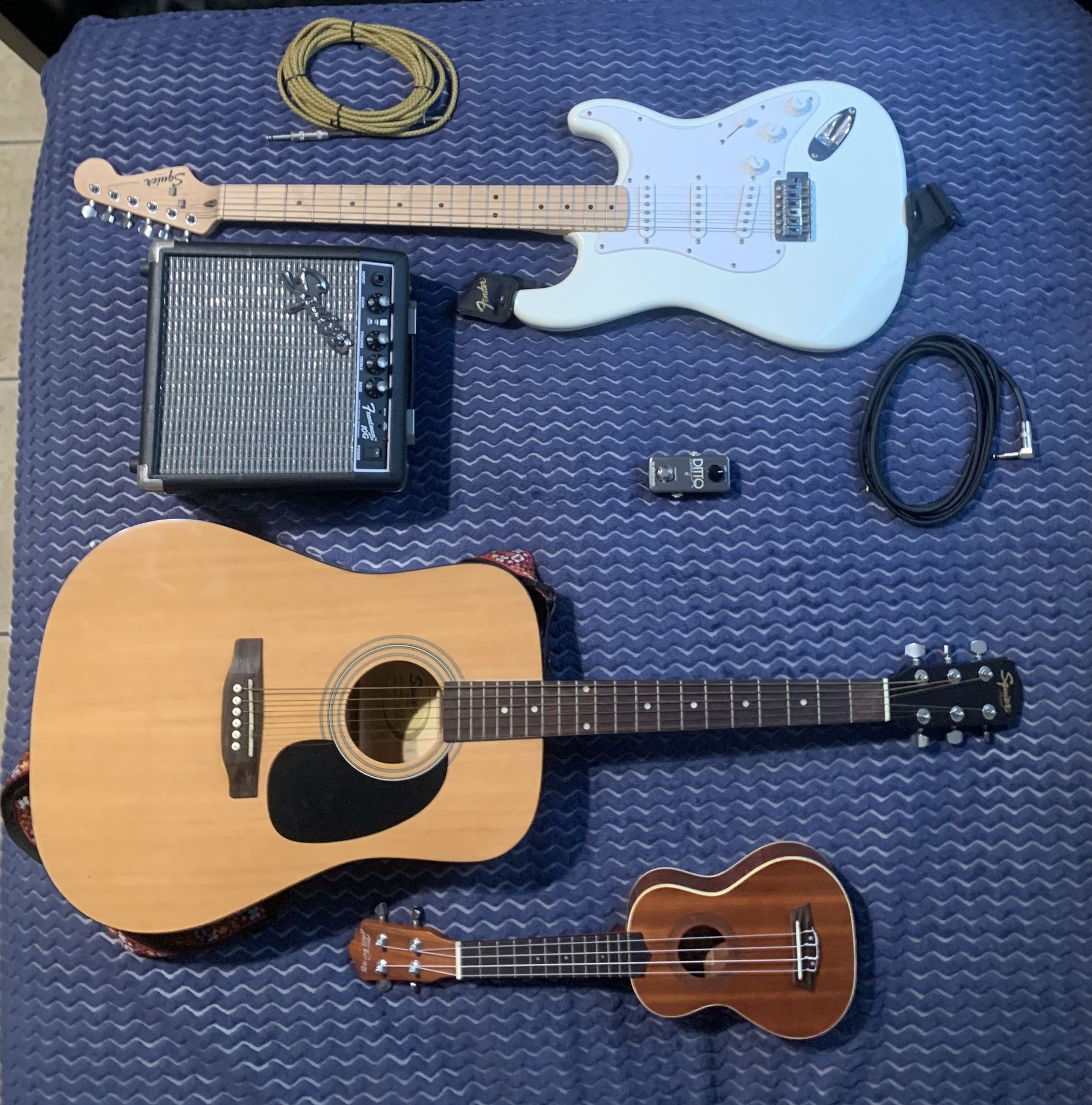 SQUIER STRATOCASTER ELECTRIC & SA-50 ACOUSTIC GUITAR