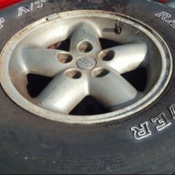 jeep wrangler tj 96 / 06 wheels and tires  15 dunlop radial set of 4 in good condition $450