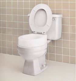 Carex Toilet Seat Riser, Elongated Raised Toilet Seat Adds 3.5 inches to Toilet Height, for Assistance Bending or Sitting, 300 Pound Retails $39.99