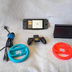 Nintendo Switch Console with Neon Blue and Red Joy-Con Wheels