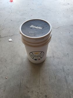 Bucket and wiffle balls