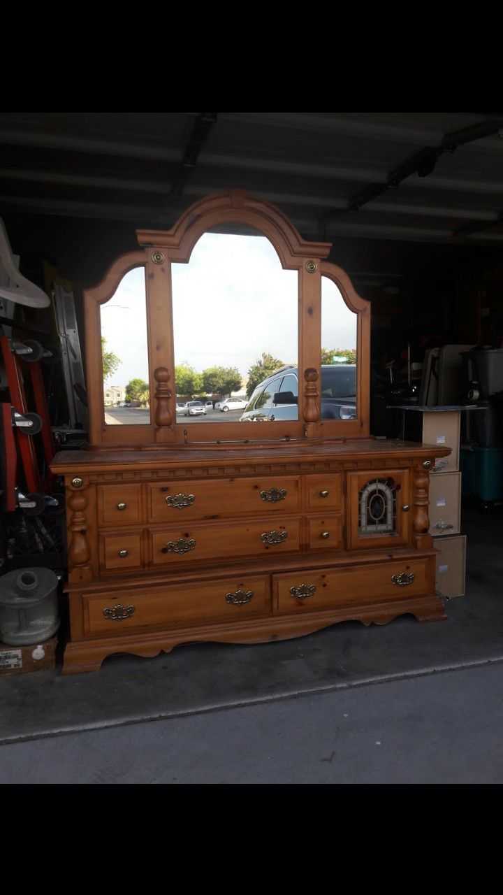 Brown dresser with mirror 60.00 and red chairs 2 for 30
