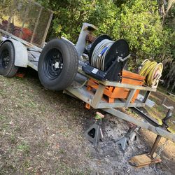 Utility trailer equipped 12 Ft long 5ft Widhose reel and storage. Ideal for various outdoor tasks.Asking $1800 altogether located Mount Dora Fla 32757