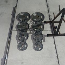 Full weight plate set with rack and Olympic barbell 300lbs total 