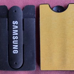 Samsung black silicone adhesive phone wallet with a built-in stand