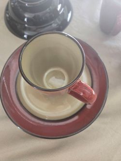 Red and Cream Ceramic Cup and Saucer Set