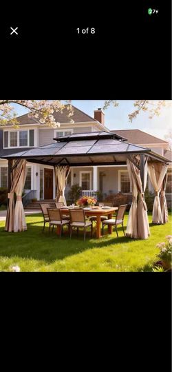 Brand new 10x13 hard top aluminum gazebo. Mosquito nets included.