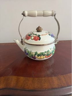Tabletops Unlimited teapot in the Kensington Garden pattern, featuring a colorful fruit design.