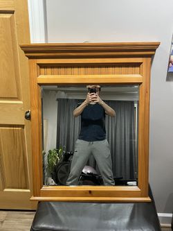 Mirror with solid wood frame