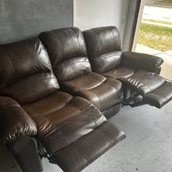 Leather couch with built in recliners