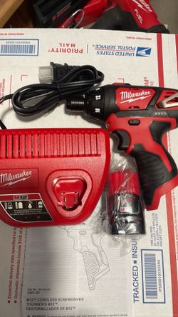 Milwaukee M12 screwdriver 2ah battery charger set 65.00