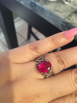 925 Sterling silver ring size 5. With red Gem stone $18