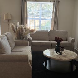 Beige Couches + Round Marble Table 