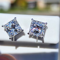 4 Carat Princess Cut Moissanite 18kt White Gold Plated Sterling Silver Stud Earrings.
