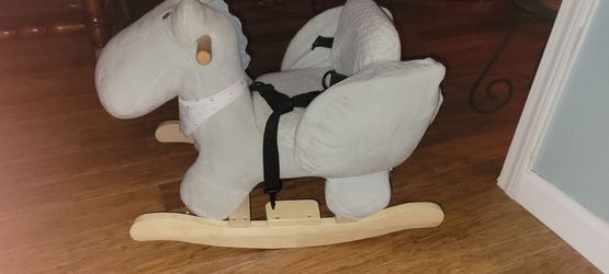 Rocking baby elephant