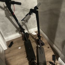 2 electric scooters