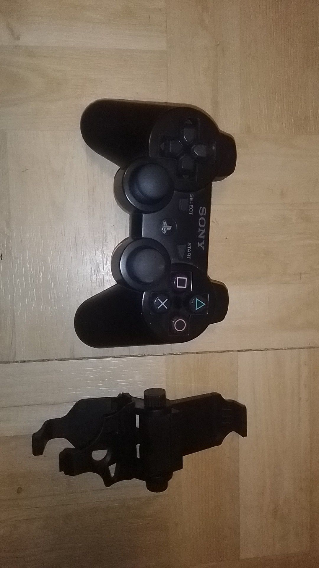 Official PS3 controller with phone attachment