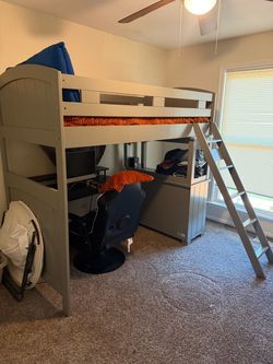 Twin bunk bed with dresser attached